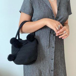 Unbranded black crochet bucket bag with pom poms
